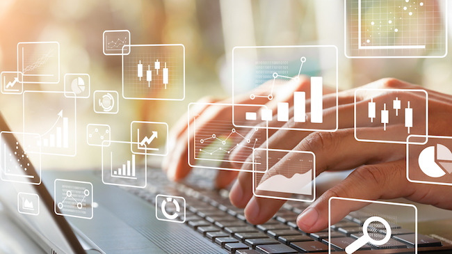 Charts and Graphs Overlaid on Laptop