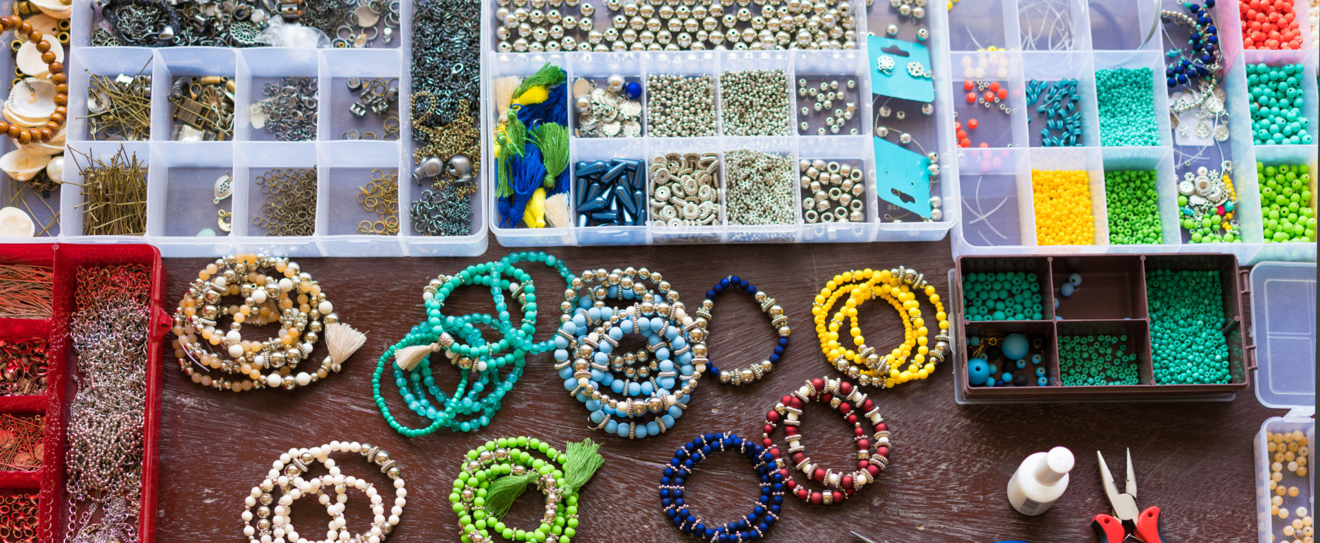 Bracelets and bracelet kits sitting on a table