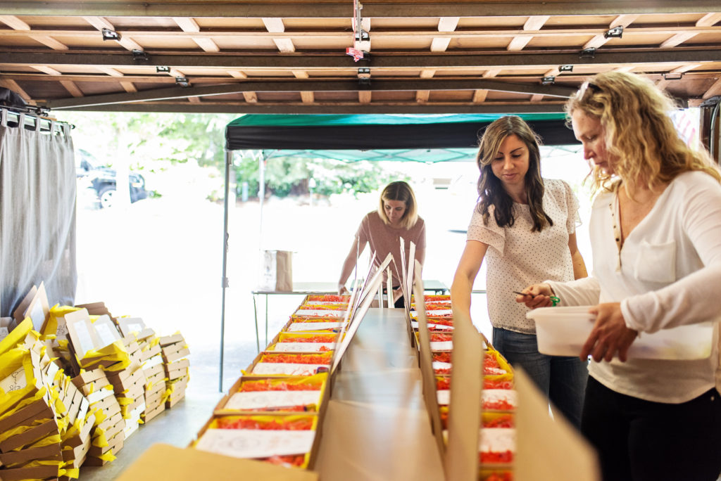 Craft + Boogie Boxes Being Packaged By Volunteers